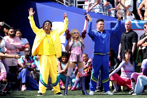  Ronaldinho, Madonna and Ronaldo perform during the Topps Final Halftime Show in the FIFA World Cup