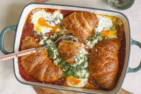 Shakshuka meets savoury bread-and-butter pudding in this share-friendly brunch dish.