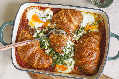 Shakshuka meets savoury bread-and-butter pudding in this share-friendly brunch dish.