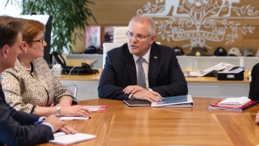 Scott Morrison meets with cabinet members, including Foreign Affairs Minister Marise Payne, on the first work day after his re-election.