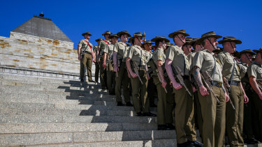 Soldiers from the Australian Army 4th Brigade 2nd Division attend Anzac Day at the Shrine of Remembrance in Melbourne.