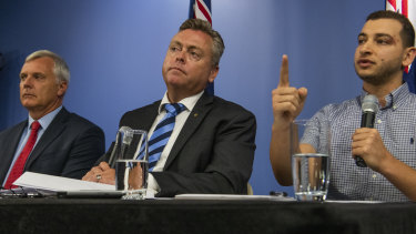 Engineering Professor Mark Hoffman (left), NSW Minister for Planning and Housing, Anthony Roberts  and Shady Eskander, chairman of the Opal  Tower body corporate at Tuesday's press conference following the release of the interim report into the building's structural failure. 