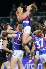 Aaron Naughton flies for a mark.