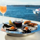 Zac Efron dined on seafood at Catalina in Rose Bay.