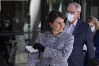 NSW Premier Gladys Berejiklian said she was disappointed national cabinet decided to halve Australia’s international arrivals.