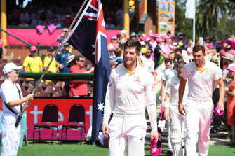Tim Paine leads the Australian team onto the field during the SCG Test against India in January 2019.