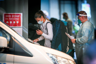 Australian Open tennis players and quarantine workers at the Grand Hyatt hotel in Melbourne on January 20.