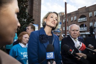 Warringah Liberal candidate Katherine Deves and former prime minister John Howard in Manly on Wednesday.