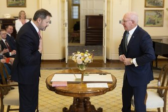 Minister for Industry and Science, Ed Husic, was gifted a pink Koran for his swearing in.