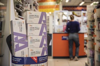 A stockpile of COVID-19 rapid antigen tests on display at Southon’s Chemist in Sydney.