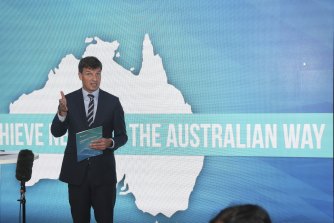 Minister for Industry, Energy and Emissions Reduction Angus Taylor speaks at the Australia pavilion during the 2021 United Nations Climate Change Conference (COP26).