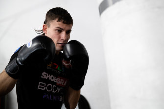 Harry Garside, who has big ambitions, works away at a heavy bag.