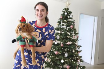 Nurse Elyse Budrodeen and dog Bodhi are entering the holiday season early to leave 2021.