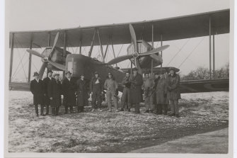 Ross and Keith Smith and their crew prepare to take off from Hounslow airfield, west London, in November 1919. 