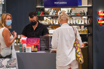 Staff and shoppers inside Bondi Junction Westfield choose to wear masks.