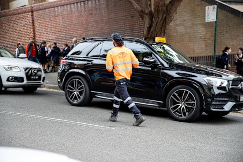 A traffic warden on patrol at SCEGGS, Darlinghurst.