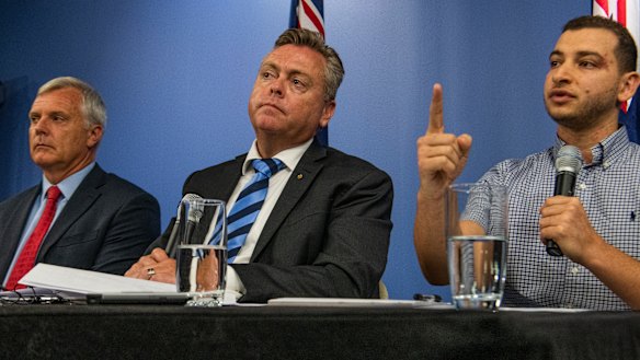 Engineering Professor Mark Hoffman (left), NSW Minister for Planning and Housing, Anthony Roberts  and Shady Eskander, chairman of the Opal  Tower body corporate at Tuesday's press conference following the release of the interim report into the building's structural failure. 