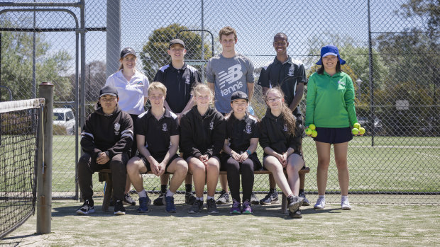 Han Nguyen joins students from Canberra High School as they learn the basics of being a ball kid for the Canberra International. 