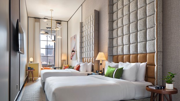 The loft double queen room at Museum Hotel was once a racquetball court.