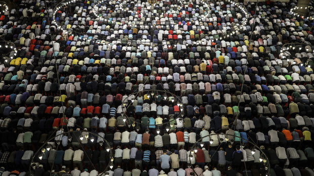 Turkish Muslims celebrate Eid in the Suleymaniye Mosque in Istanbul.