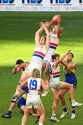 Aaron Naughton flies high for the Bulldogs.