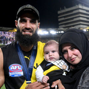 Bachar Houli after the 2020 grand final win with wife Rouba and son Mohamed.