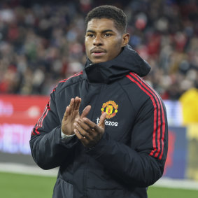 Manchester United star Marcus Rashford applauds the bumper crowd following the clash with Crystal Palace.