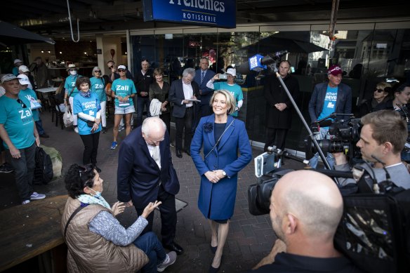 Zali Steggall supporters followed the media pack through the Manly Corso, ensuring their T-shirts remained in shot.