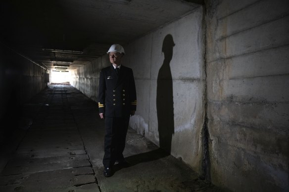 Lieutenant Brendan Trembath in the Petticoat Lane tunnel under Garden Island. 