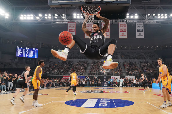 Cop that: United's Shawn Long jams one home against the shell-shocked Sydney Kings on Monday night.