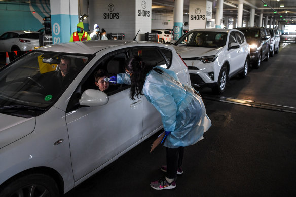 Queues at the Southland Shopping Centre's drive through COVID-19 testing facility on Monday, where long waits were reported.