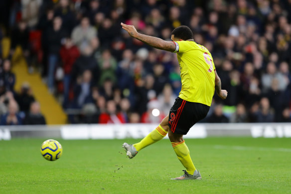 Troy Deeney scores from the spot for Watford against Manchester United at Vicarage Road on Sunday.