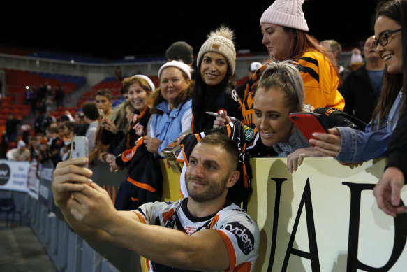 Robbie Farah takes a selfie with fans last year. Players are being told not to have contact with fans due to the coronavirus outbreak.