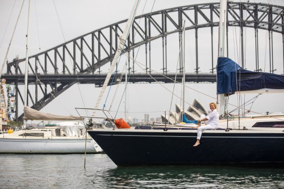 No regrets: Emma Harvey on her 38-foot yacht Emma Jean, which she bought at the start of the pandemic.