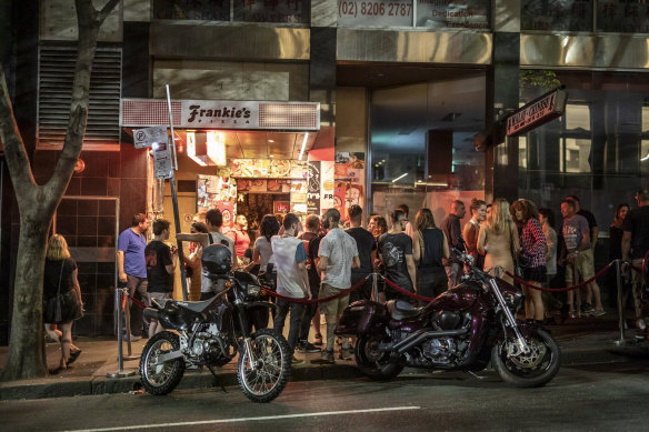 Punters lined up to get into Frankie’s Pizza on the night lockout laws were phased out in January 2020.