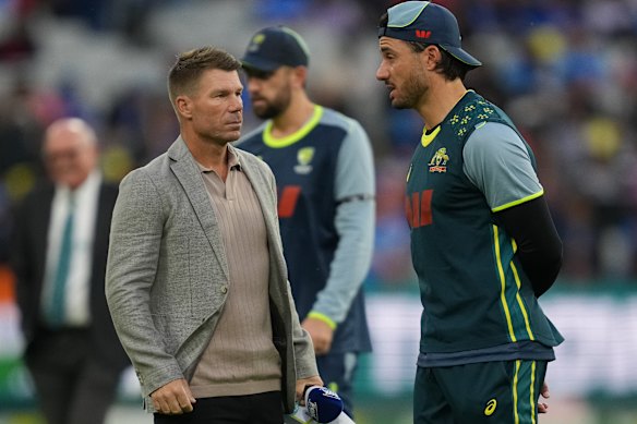 David Warner and Marcus Stoinis of Australia chat pre-game.