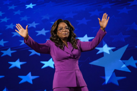 Talk show host Oprah Winfrey leaves the stage after her speech.