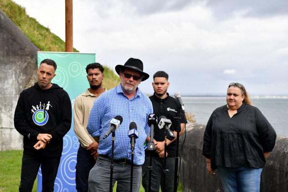 Gujaga Foundation chairman ​Ray Ingrey (far left), senior curator at the National Museum ​of Australia Dr Ian Coates (centre) and  La Perouse Aboriginal Land Council chairwoman Noeleen Timbery (far right) give an update at Bare Island in Botany Bay on the upcoming return of the historic Kamay spears.