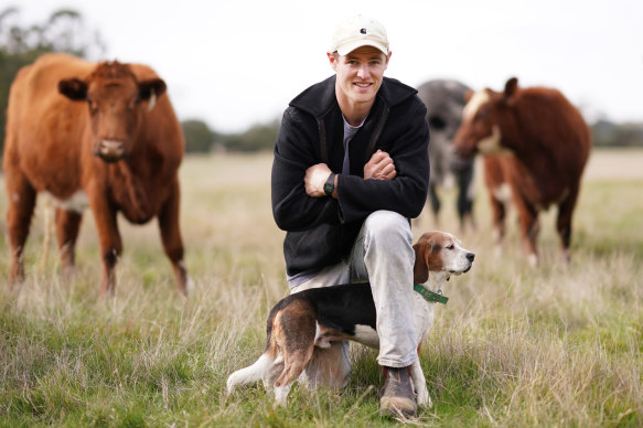 David Astbury with his dog Dougie on his father's farm in Raglan.
