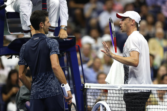 Australia's John Millman, right, doesn't believe it should have taken the COVID-19 crisis for Novak Djokovic and the rest of tennis' elite to consider inequality in the game.