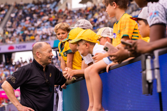 Eddie Jones mingles with fans at the Sydney Sevens.