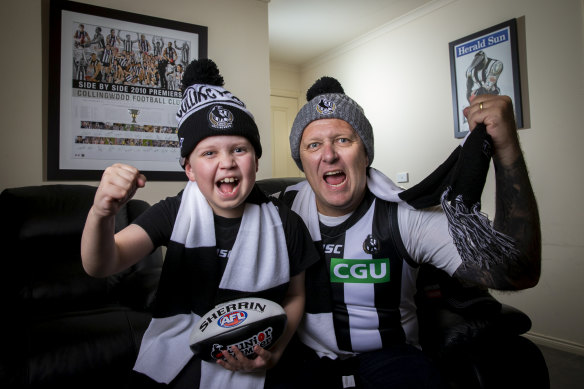Collingwood supporters Michael Preston and son Brandon age 9 before tommorows game against Richmond Tigers. 