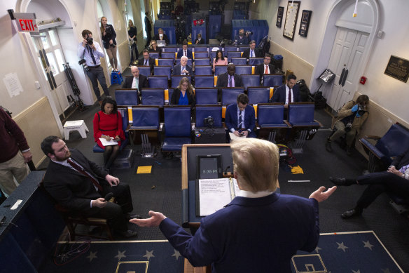 President Donald Trump speaks during a coronavirus task force briefing at the White House on Saturday, April 18.
