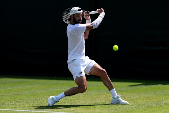 Jordan Thomson in action in his first round match.