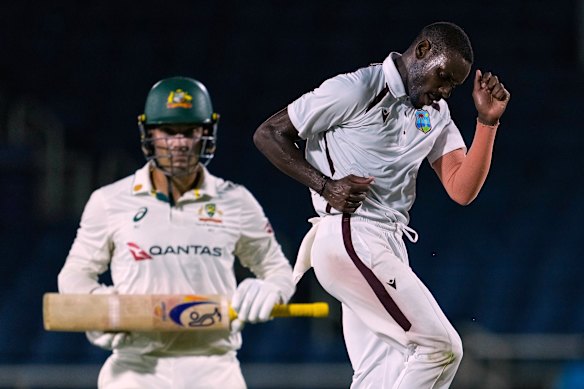 Justin Greaves celebrates taking the wicket of Alex Carey.