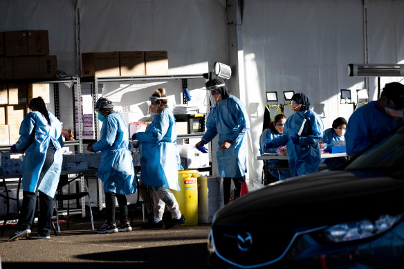 A drive-through COVID-19 testing clinic in Roselands, Sydney.