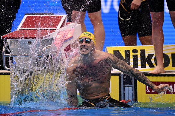 Kyle Chalmers celebrate after the Australian men’s relay team claim gold.