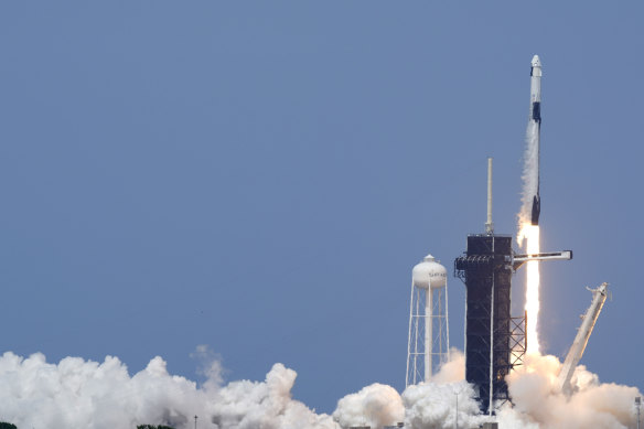 A SpaceX Falcon 9, with NASA astronauts Doug Hurley and Bob Behnken in the Crew Dragon capsule, lifts off from Pad 39-A at the Kennedy Space Centre in Cape Canaveral.