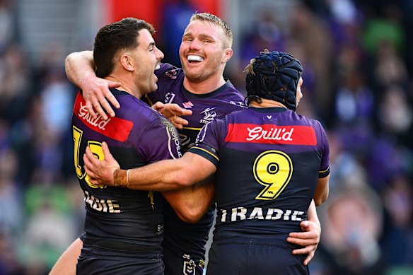 The Storm celebrate a try by Trent Loiero (left).