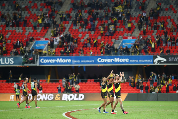 The Tigers show their appreciation at Metricon Stadium.
